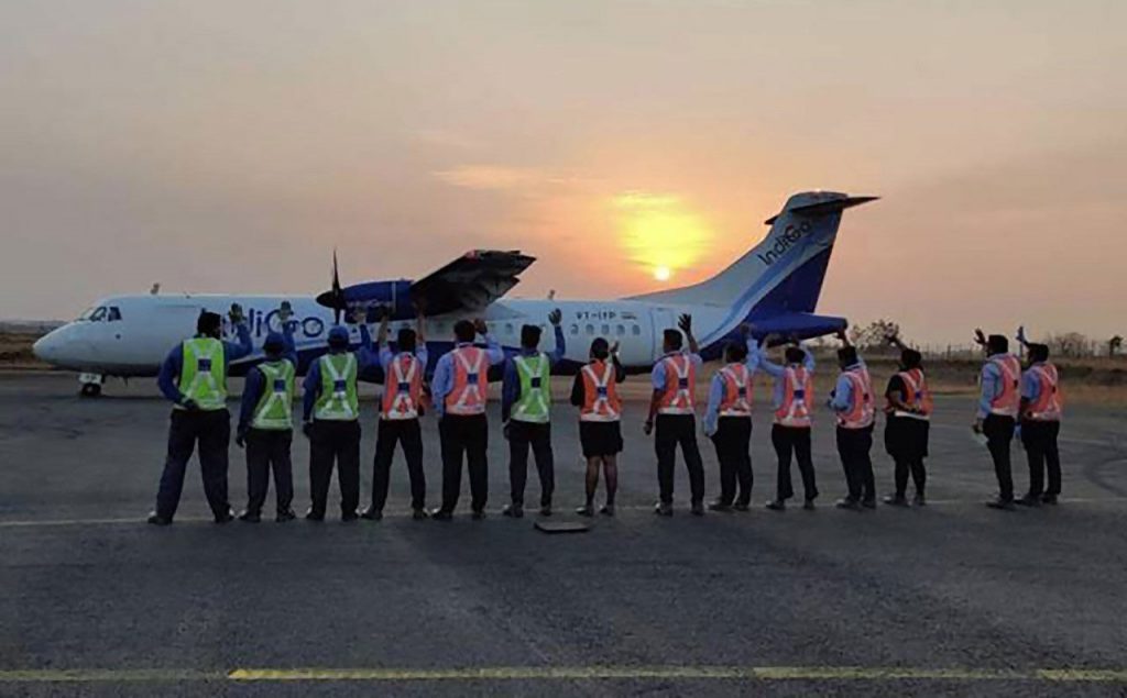 Acknowledging the role played by regional aircraft in humanitarian efforts during the COVID-19 pandemic crisis, IndiGo’s ground crew wave to passengers as ATR 72-600 (MSN 1529) lands at sunset